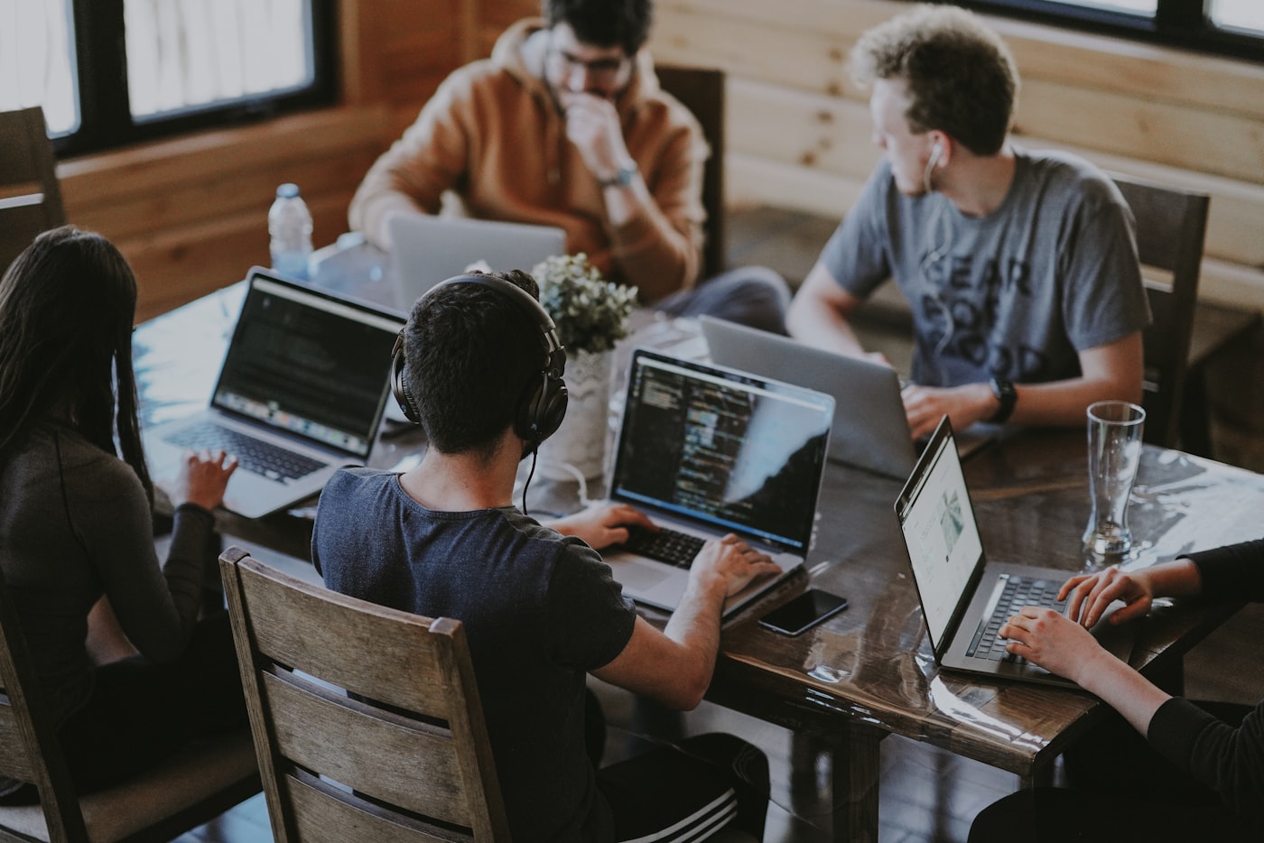 Software engineers collaborating at computers